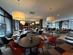 Ein Sitzbereich in der Unterkunft XO Hotels Park West