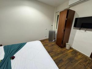 TV a/nebo společenská místnost v ubytování Lorenda palace hotel