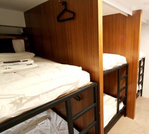 Postel nebo postele na pokoji v ubytování Daan Park Hotel