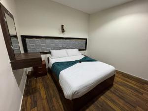 Postel nebo postele na pokoji v ubytování Lorenda palace hotel
