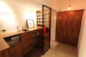 Kuchyň nebo kuchyňský kout v ubytování Daan Park Hotel