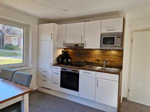 Küche/Küchenzeile in der Unterkunft Urlauberdorf Haus 31d