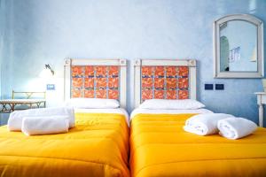 Voodi või voodid majutusasutuse Motel - Hotel Nautico Pozzallo toas