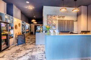 Kuchyň nebo kuchyňský kout v ubytování Garner Hotel Vienna by IHG