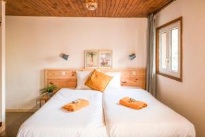 Ένα ή περισσότερα κρεβάτια σε δωμάτιο στο Hotel Le Pied Moutet