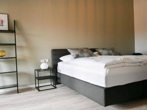 Ένα ή περισσότερα κρεβάτια σε δωμάτιο στο Ferienwohnung Deichzauber