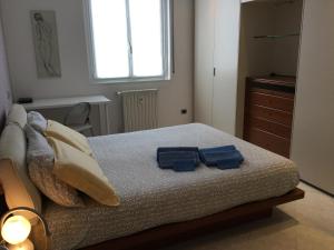 Кровать или кровати в номере Niguarda Bicocca Flat