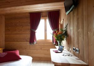 TV a/nebo společenská místnost v ubytování Hotel Funivia