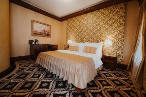 Voodi või voodid majutusasutuse Historic Boutique Hotel Cattaro toas