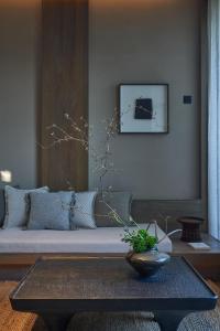 Posezení v ubytování Yixing Yuzizai Bamboo Sea Resort + 160 fotografií