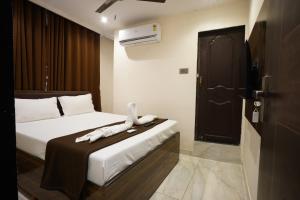 Hotel Blissful客房内的一张或多张床位
