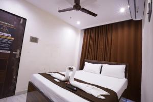 Hotel Blissful客房内的一张或多张床位