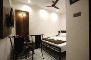 Hotel Blissful客房内的一张或多张床位