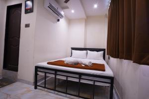 Hotel Blissful客房内的一张或多张床位