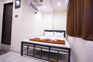 Hotel Blissful客房内的一张或多张床位