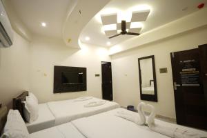 Hotel Blissful客房内的一张或多张床位