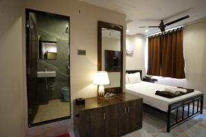 Hotel Blissful客房内的一张或多张床位