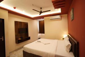 Hotel Blissful客房内的一张或多张床位