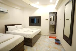 Hotel Blissful客房内的一张或多张床位