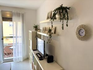 TV a/nebo společenská místnost v ubytování Apartamento Roberto By Solymar Holiday