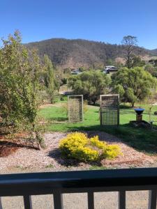 a view of a garden from a balcony at The Manse Omeo in Omeo