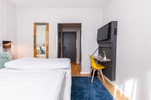 Postel nebo postele na pokoji v ubytování Garner Hotel Vienna by IHG