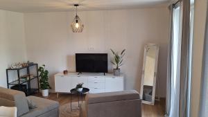 TV a/nebo společenská místnost v ubytování Apartment GA-JA + 6 fotografií