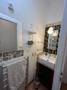 a bathroom with a sink and a mirror at La Bonne Etoile - The Good Star in Moustiers-Sainte-Marie +49 photos