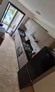 Cuisine ou kitchenette dans l'établissement Appartement Domaine de Noria