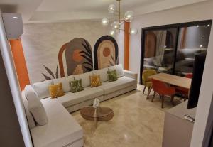 Coin salon dans l'établissement Appartement Domaine de Noria
