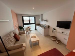 TV a/nebo společenská místnost v ubytování Estudio Nuevo Amanecer 1