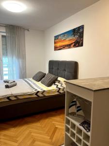 Postel nebo postele na pokoji v ubytování Studio Apartman Karlo