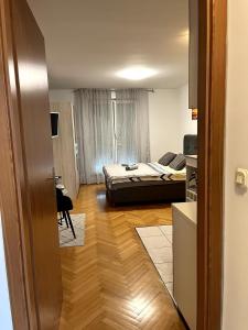 Postel nebo postele na pokoji v ubytování Studio Apartman Karlo