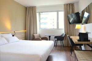 TV a/nebo společenská místnost v ubytování Eurohotel Diagonal Port