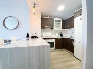 Kuchyňa alebo kuchynka v ubytovaní Sea Glimpse apartamento de vacaciones