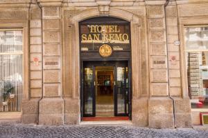 a hotel san remo entrance to a building at Hotel San Remo in Rome