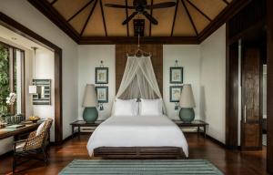 Ein Bett oder Betten in einem Zimmer der Unterkunft Four Seasons Resort Koh Samui