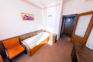 Posteľ alebo postele v izbe v ubytovaní Hotel Vsacan