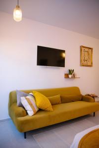 TV a/nebo společenská místnost v ubytování La RESIDENCE