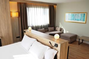 Postel nebo postele na pokoji v ubytování Eurohotel Diagonal Port + 37 fotografií