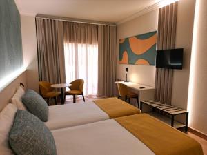 Postel nebo postele na pokoji v ubytování Ukino Palmeiras Village - 24h All Inclusive + 65 fotografií