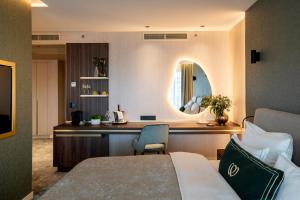 Łóżko lub łóżka w pokoju w obiekcie Le Primore Hotel & Spa