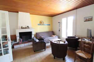 Un lugar para sentarse en Mais 5 pièces 10 couchages SAINT PIERRE D'OLERON SPO000-1011
