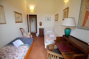 Posteľ alebo postele v izbe v ubytovaní Capponi apartment
