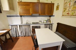 Kuchyňa alebo kuchynka v ubytovaní Capponi apartment + 10 fotografií