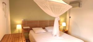 Posteľ alebo postele v izbe v ubytovaní La Rose des Vents & Spa - Gite La Parenthèse