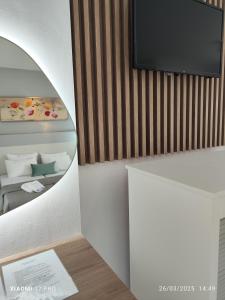 TV a/nebo společenská místnost v ubytování Filomeni Studios
