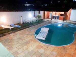 Kolam renang di atau dekat dengan Mares de Aconchego SPedro Aldeia