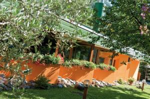 Vonkajšia záhrada v ubytovaní Hotel Carnia
