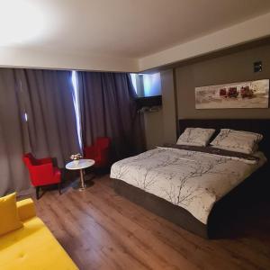 Postel nebo postele na pokoji v ubytování Driti Hotel & Apartments